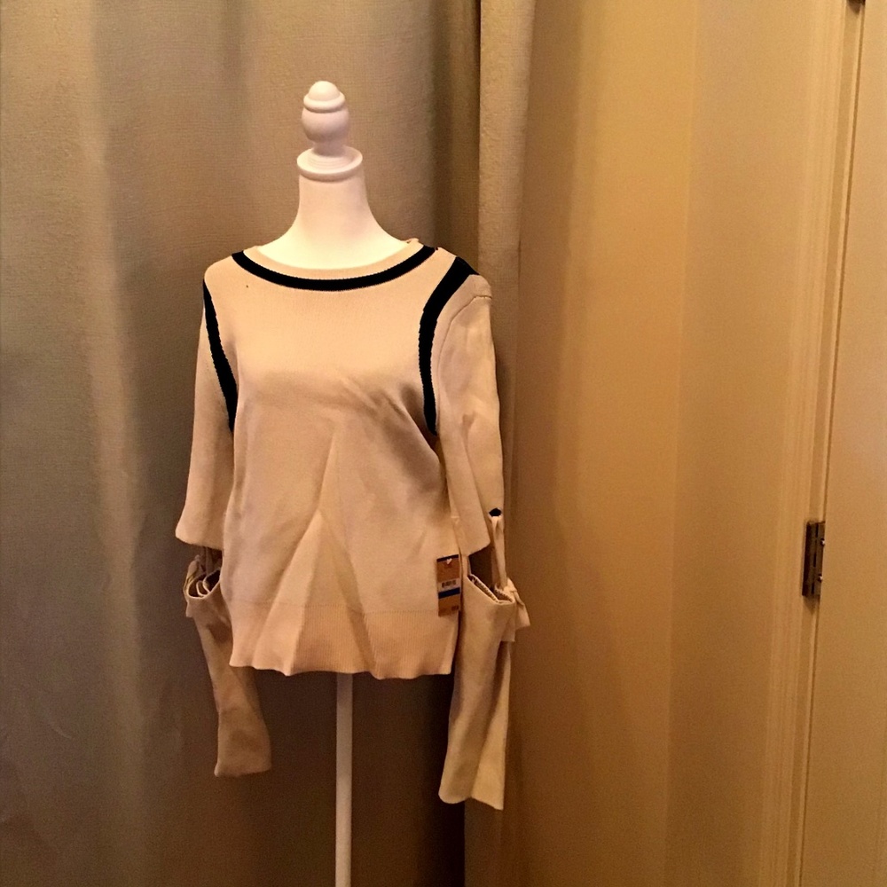 Beautiful Rachel Roy Sweater with split/open elbow